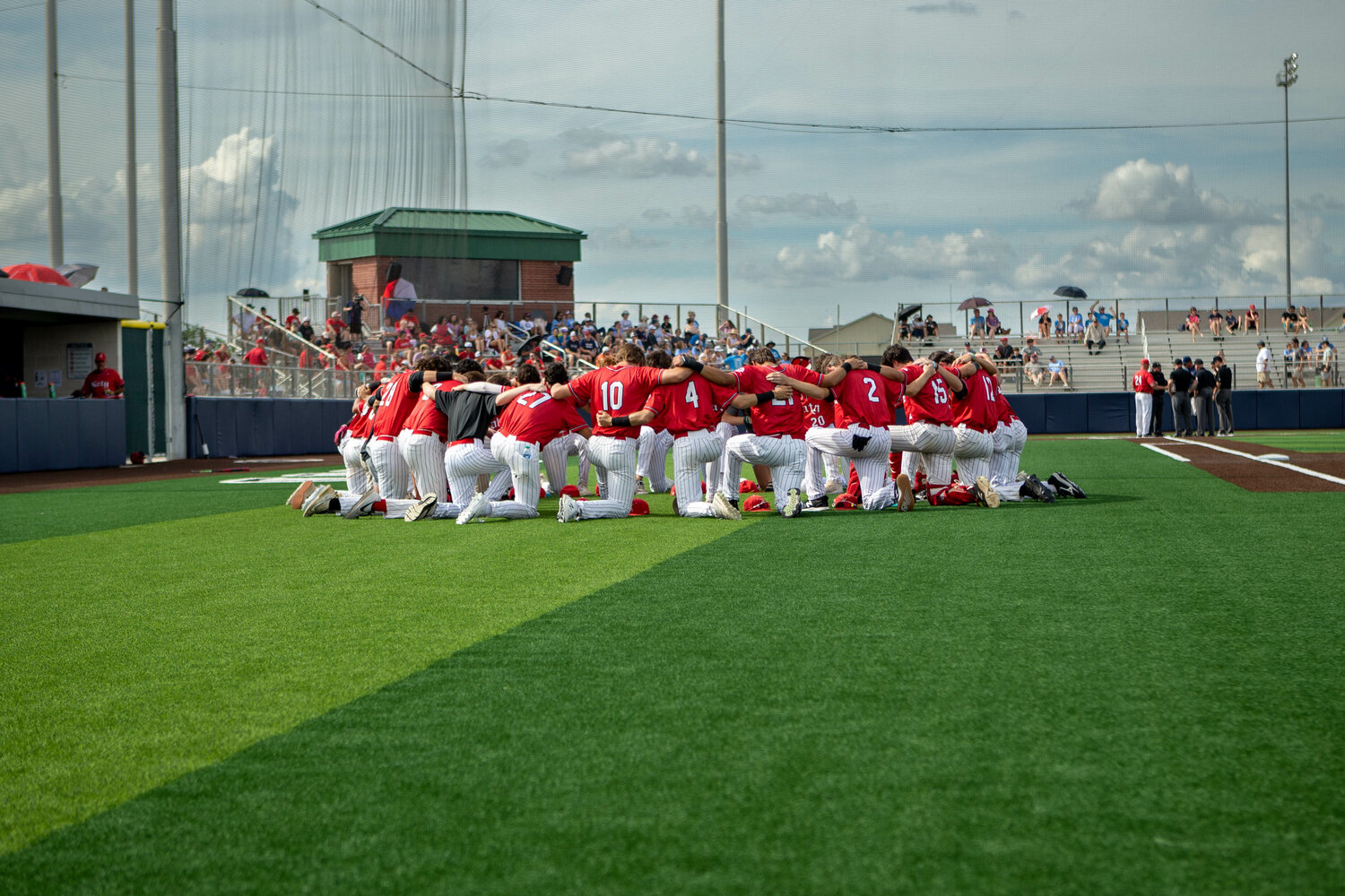 Katy circles up after the sweep of Tompkins in the regional quarterfinals.